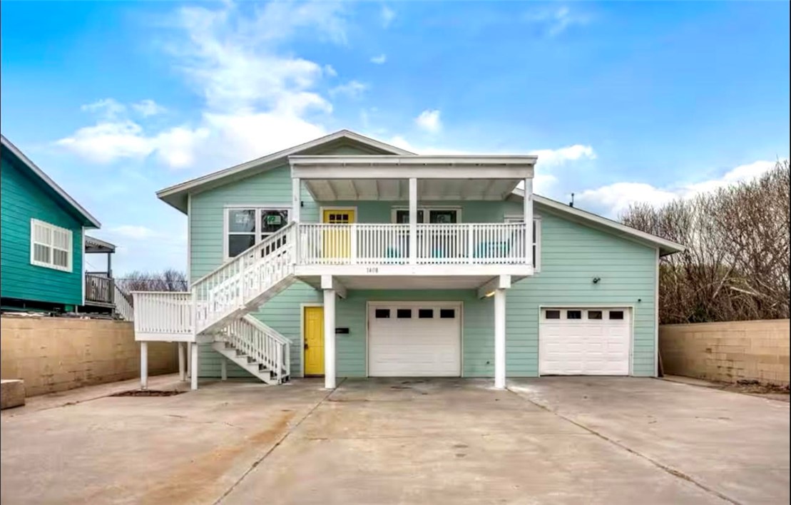 a front view of a house with a garage