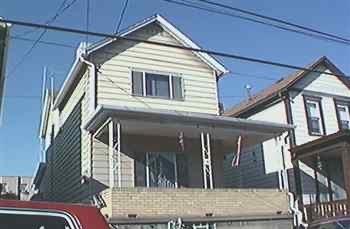 a view of a house with a balcony