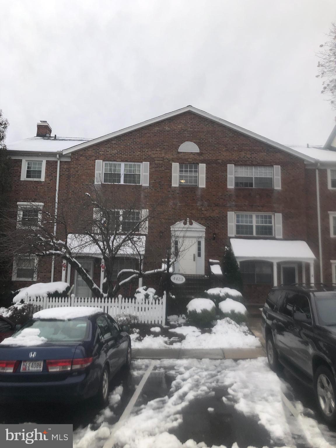 a front view of a house with yard