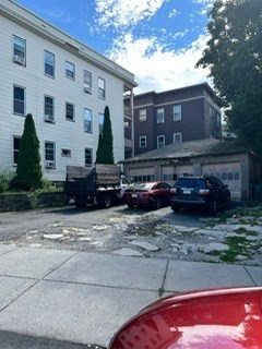 a view of a building with a street