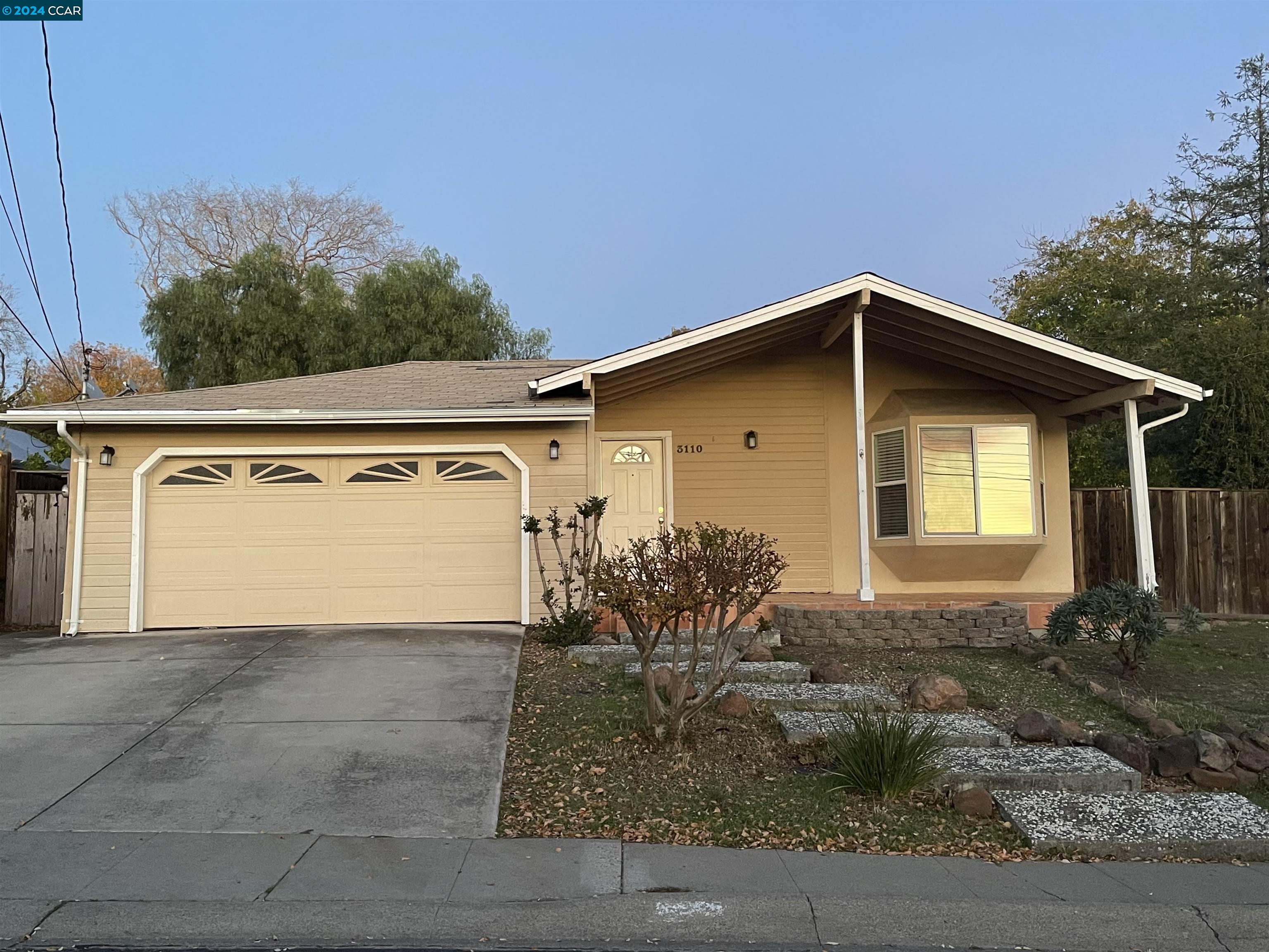 a front view of house with yard