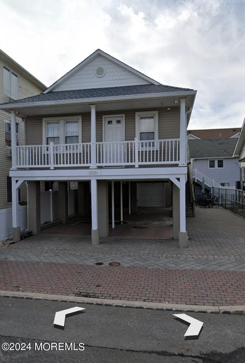 a view of house with front door