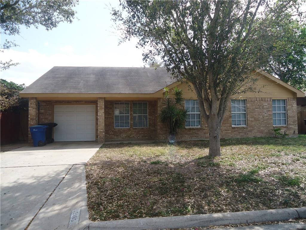 Ranch-style home with a garage