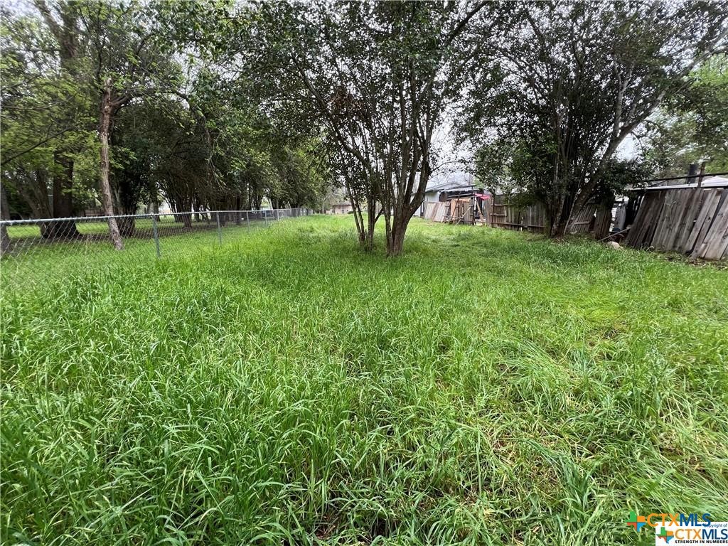 a view of a house with a park