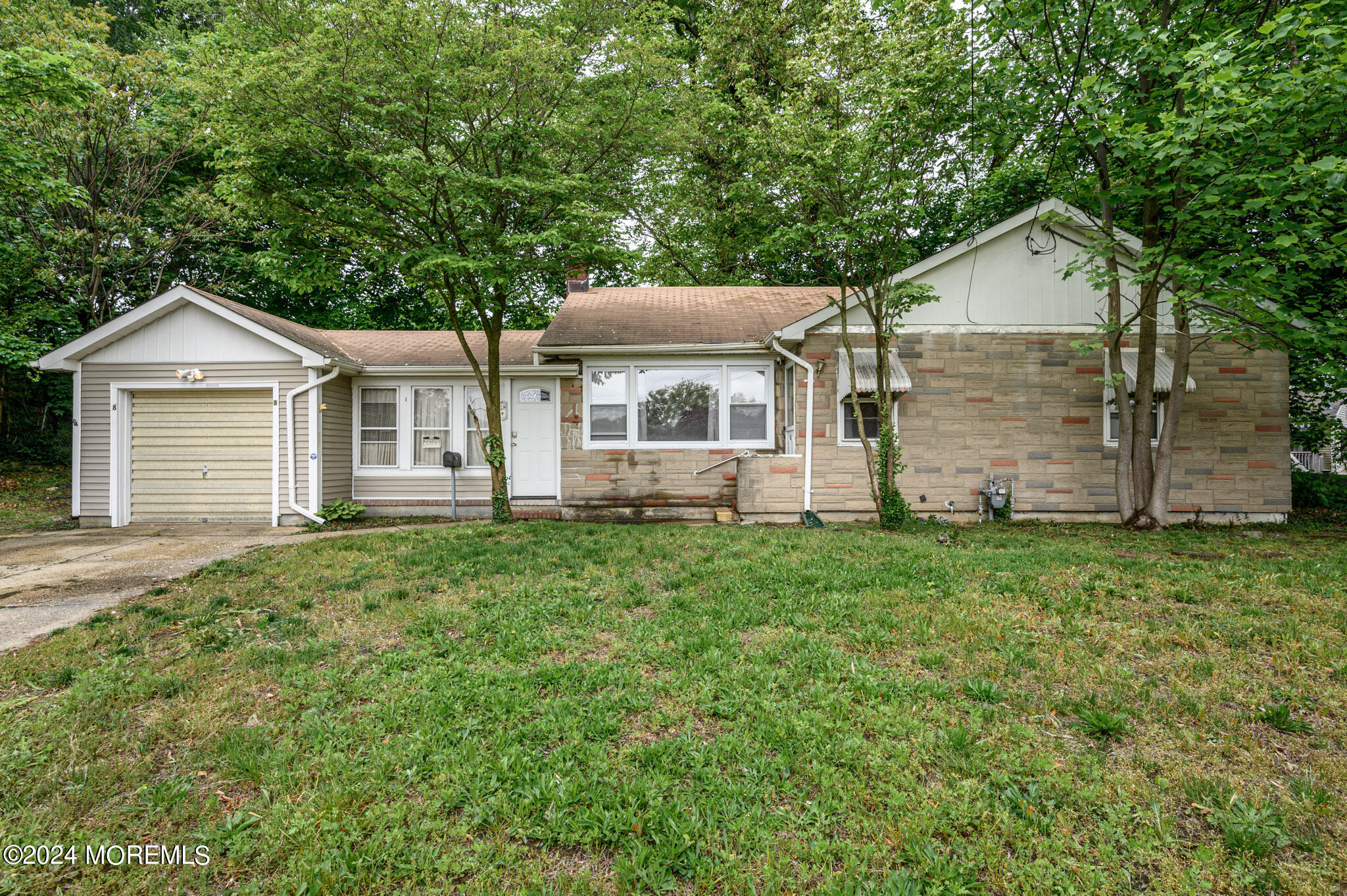 front view of a house with a yard