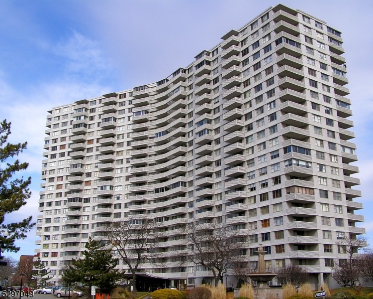 a view of a building with a street