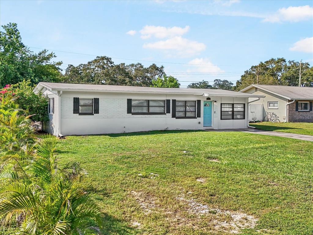 front view of a house with a yard