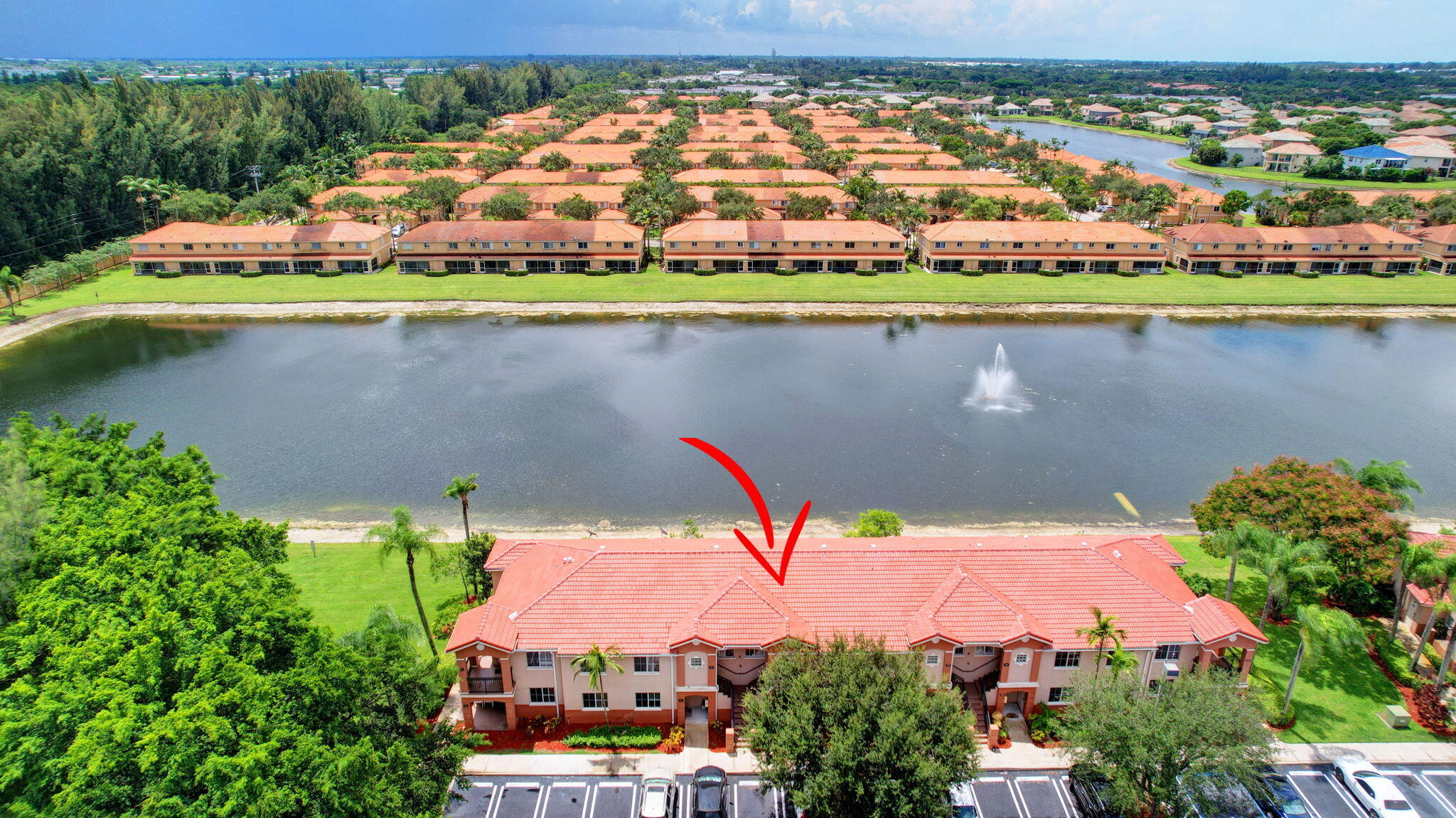 an aerial view of a swimming pool and outdoor space