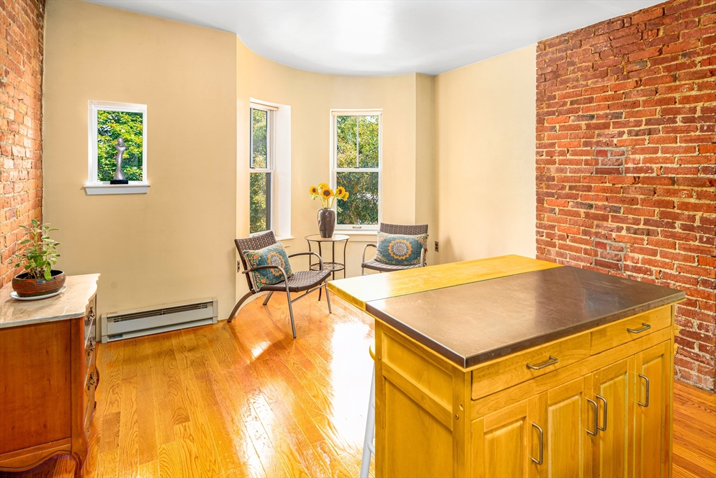 a room with a table and a window