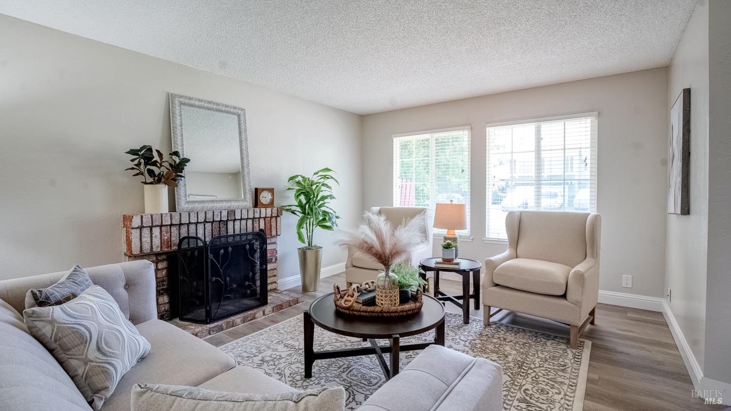 Gorgeous formal living space with fireplace