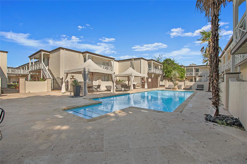 a view of a house with swimming pool