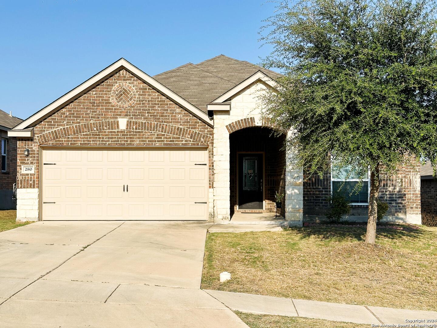 a view of a house with a outdoor space