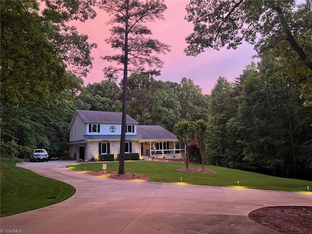 Welcome Home! Front with beautiful wrap around covered porch!