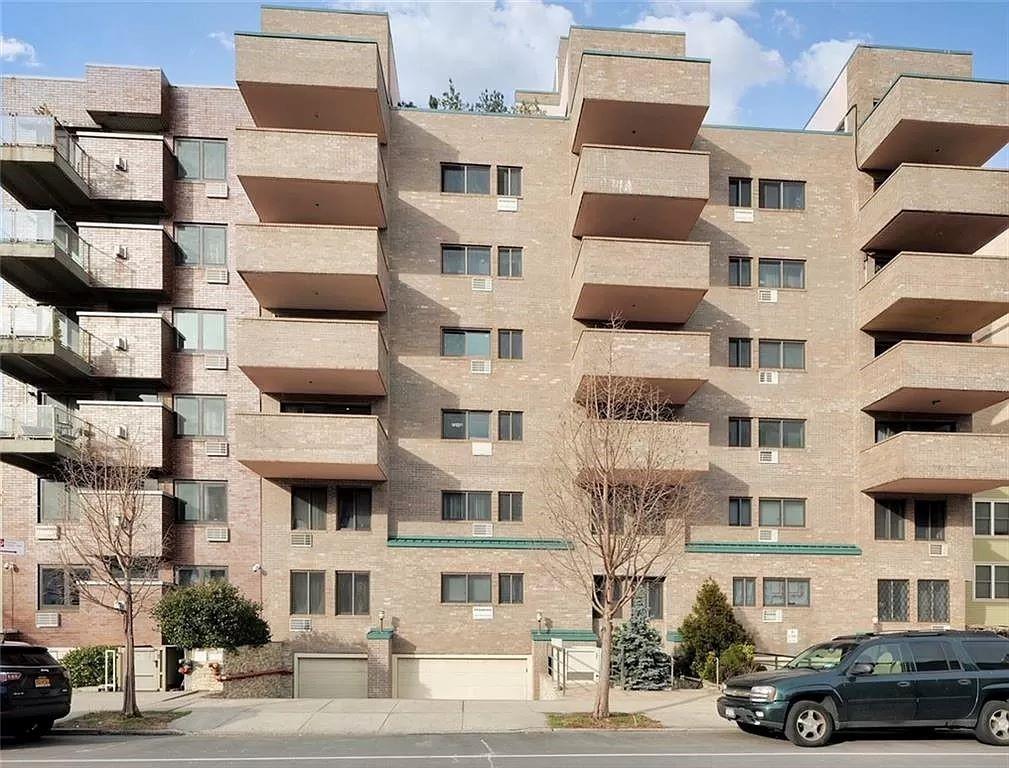 a front view of a building with a street