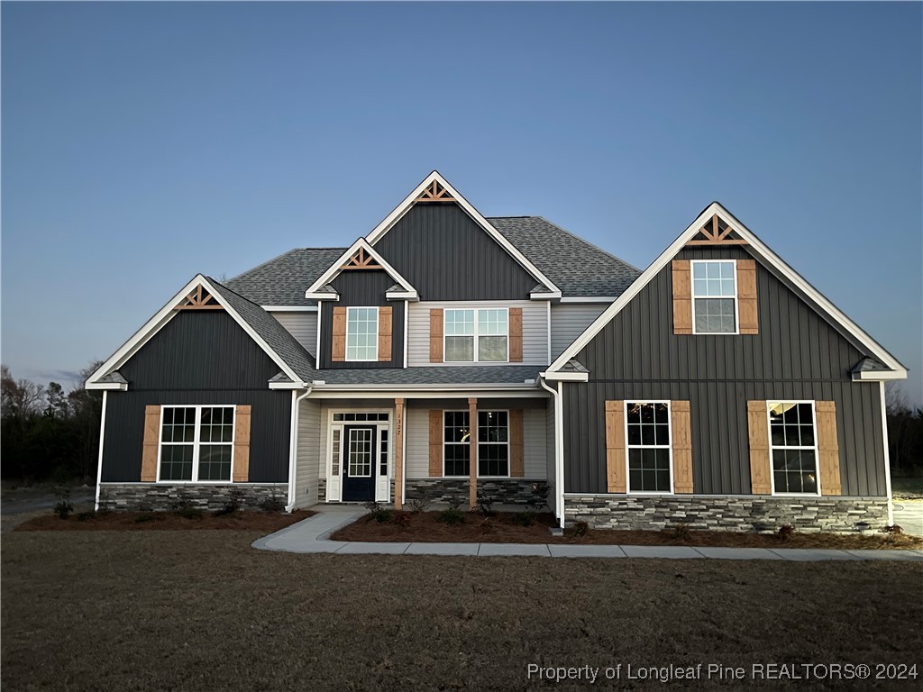 a front view of a house with yard