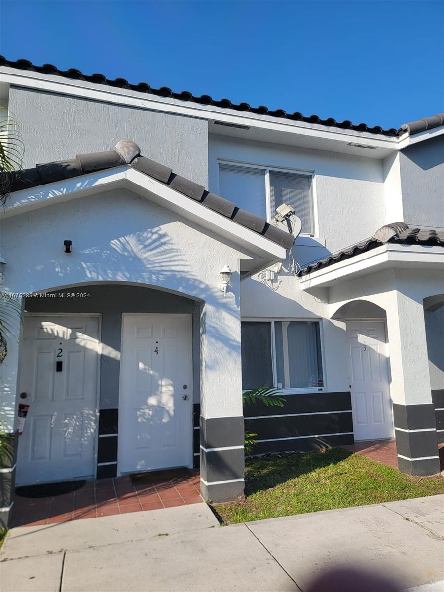 front view of a house with a garage