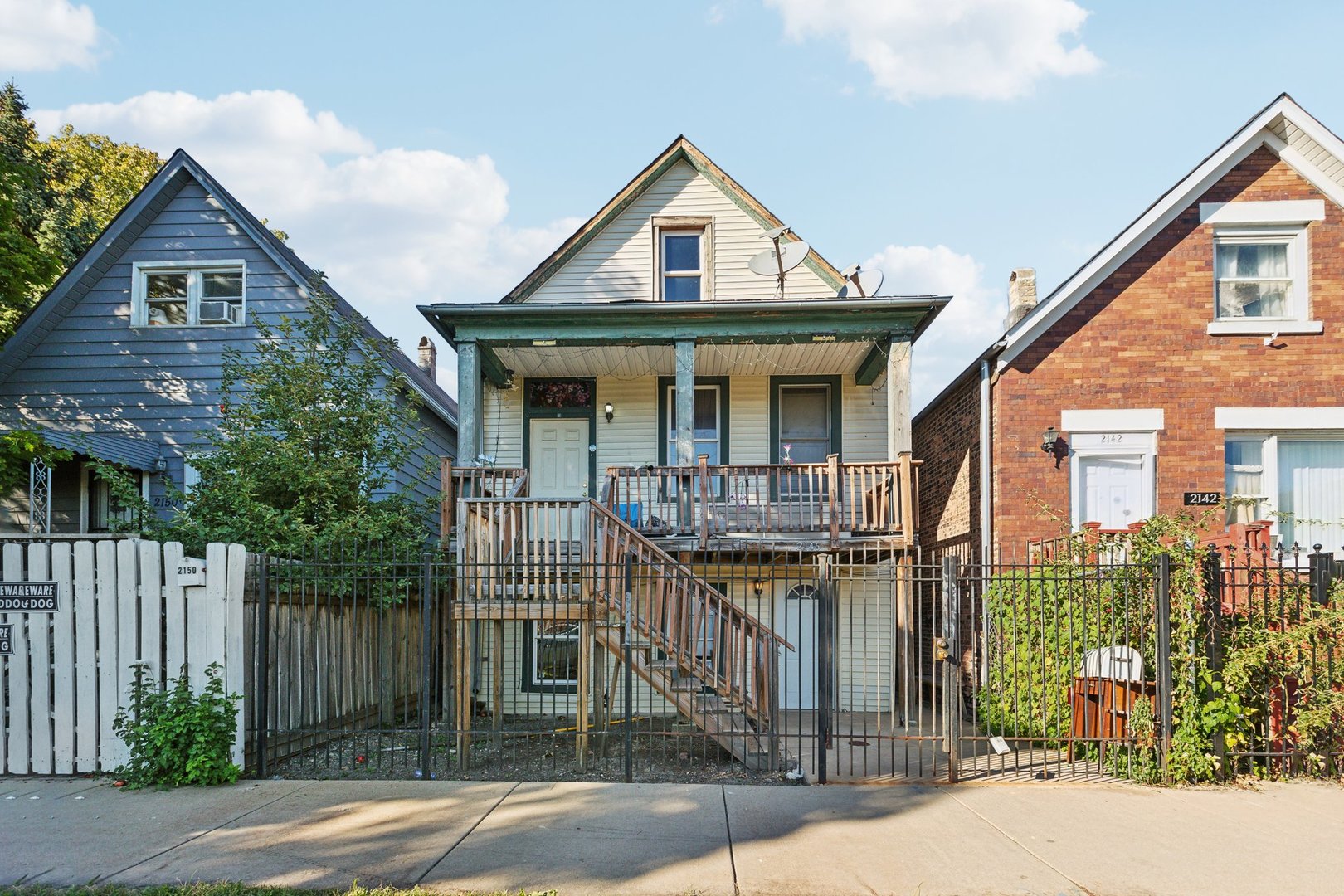 a front view of a house with a porch