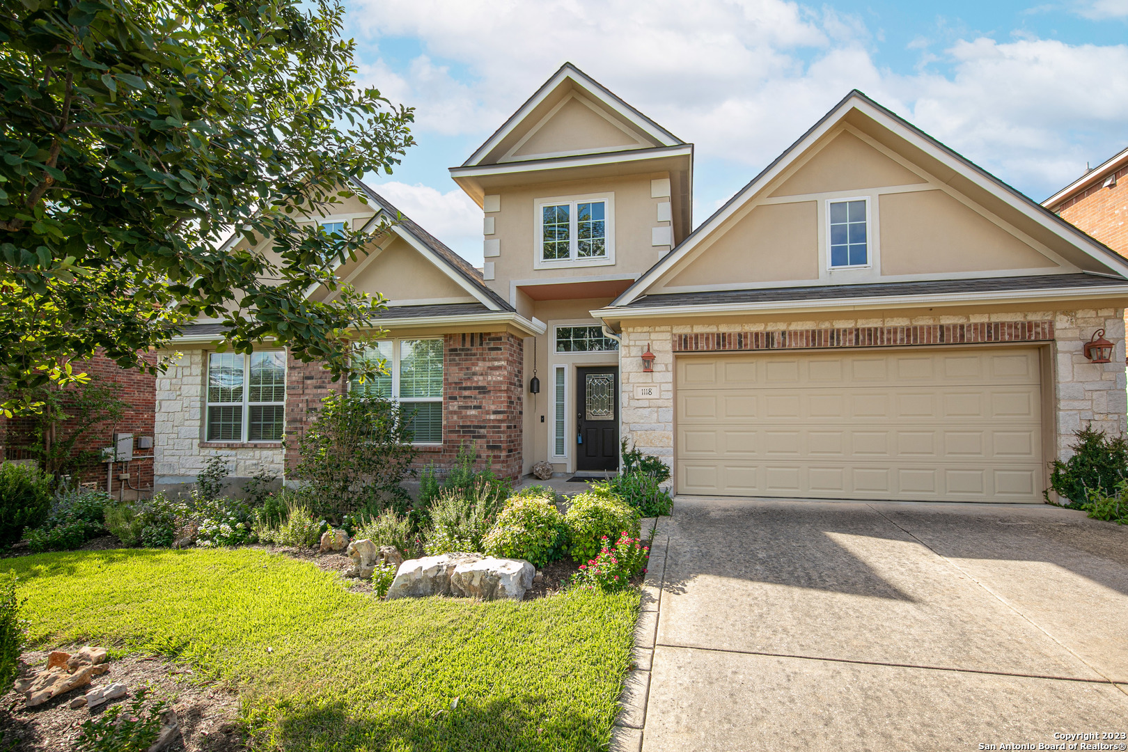 front view of house with a yard