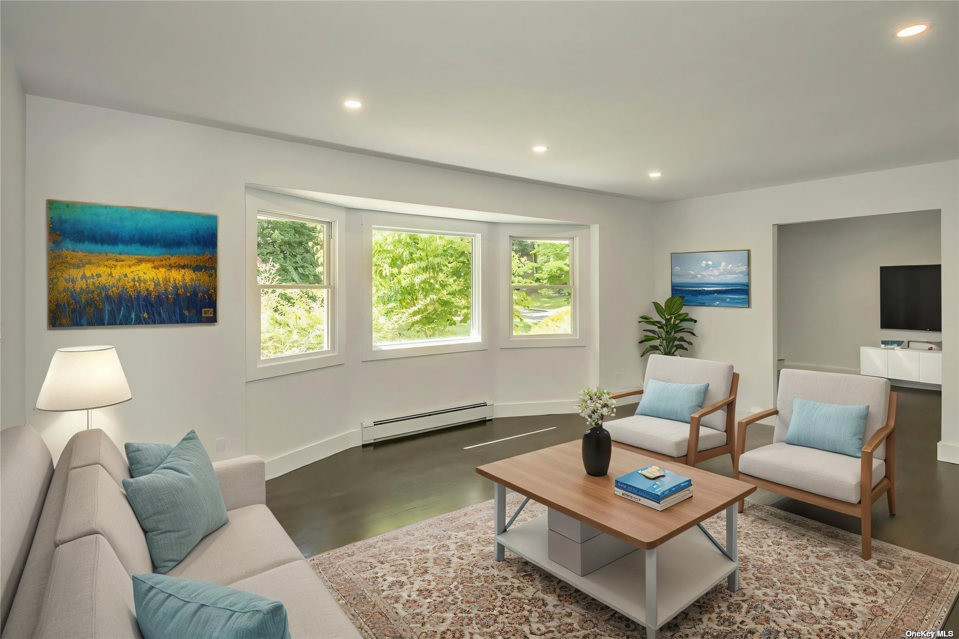 a living room with furniture and a window