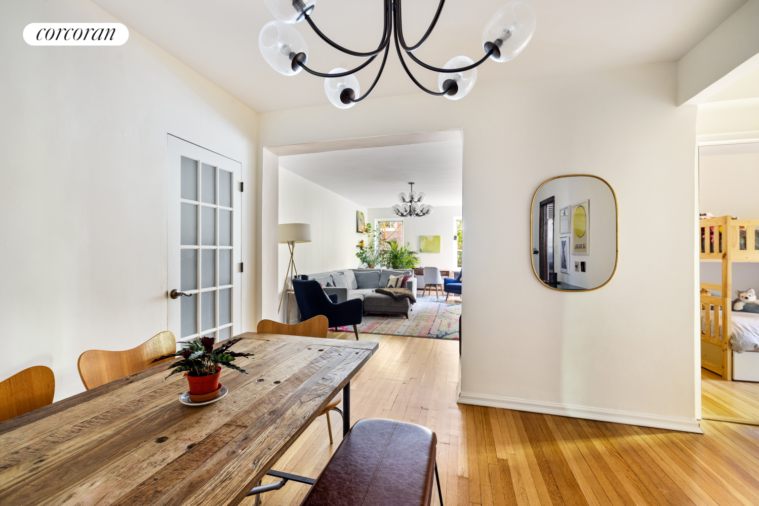 a view of dining room and wooden floor