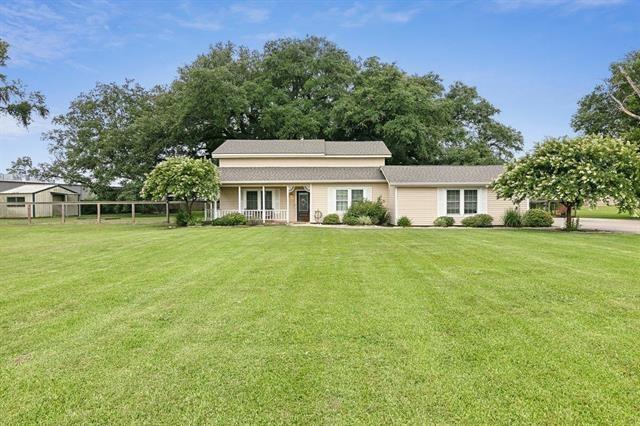 a house view with a garden space