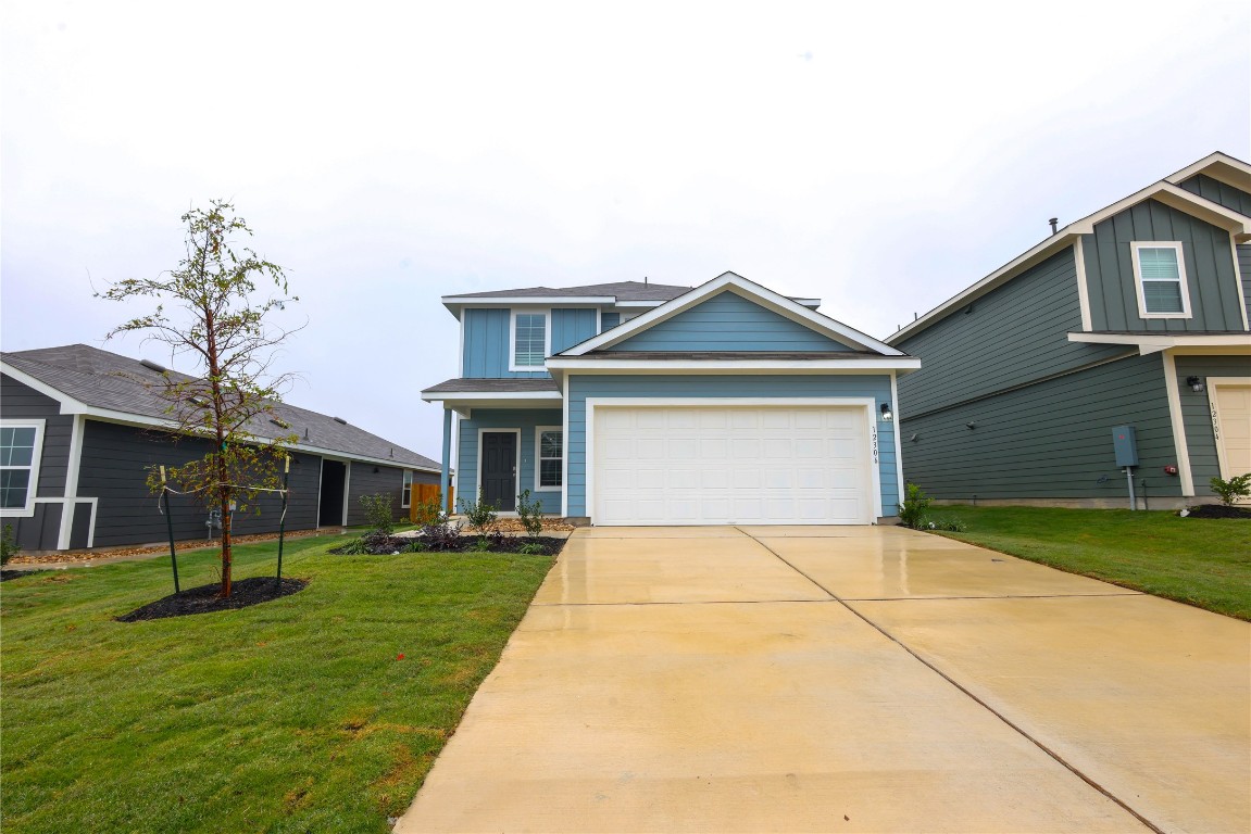 a front view of house with yard