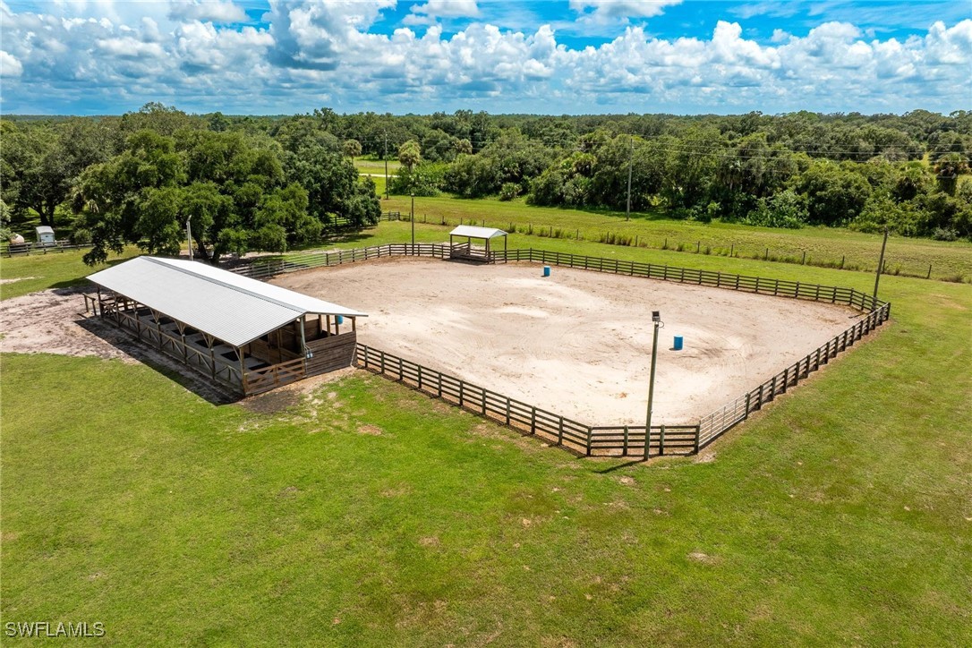 a view of a swimming pool with a yard