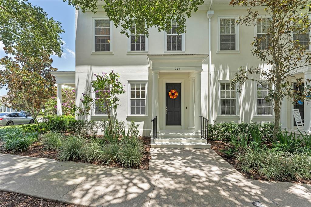 front view of a house with a yard