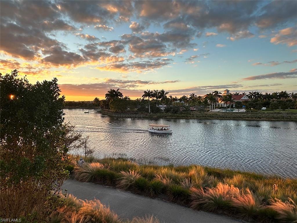 a view of a lake in middle of a city