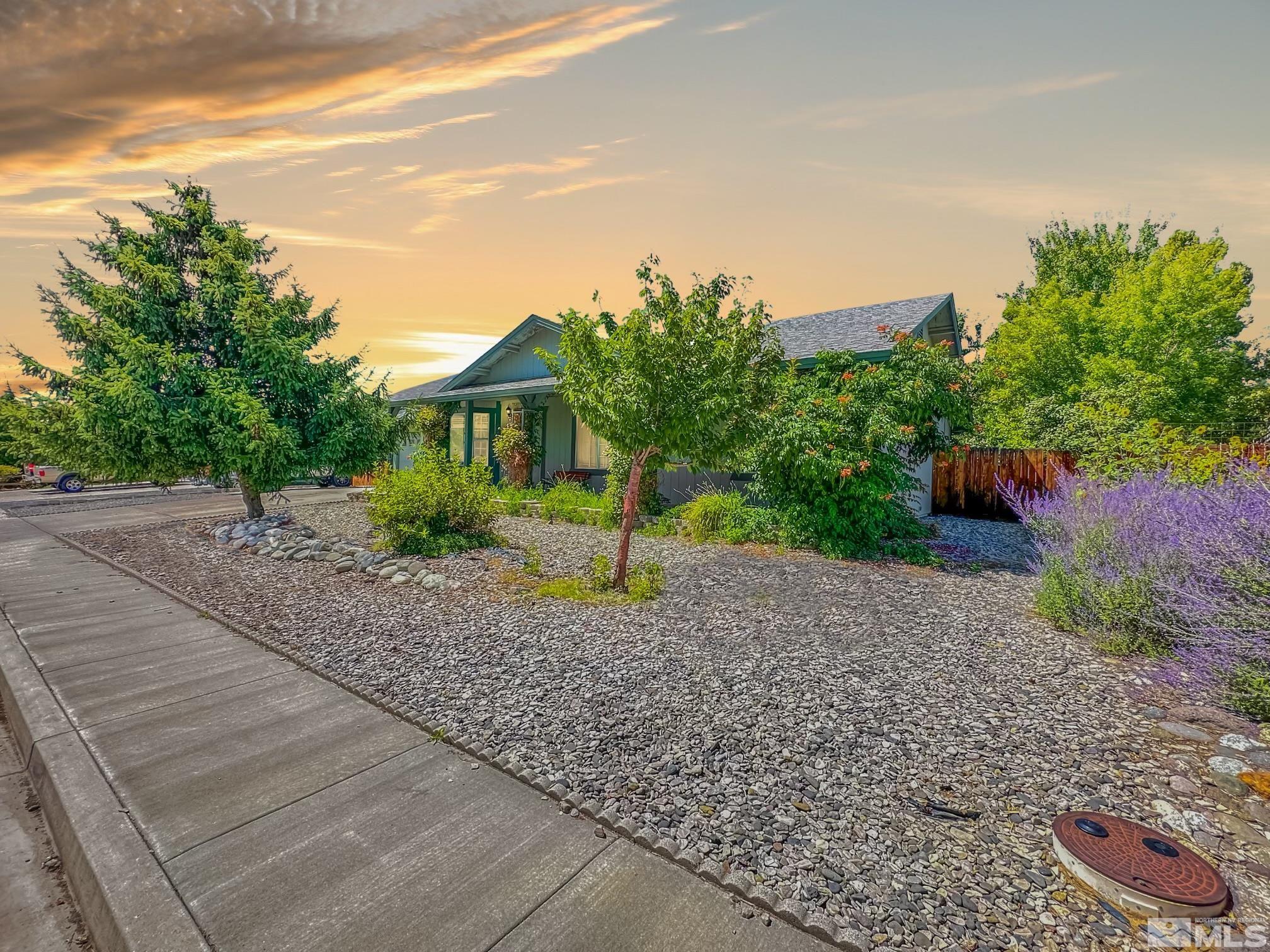 a house view with a garden space