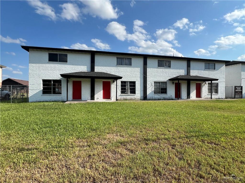 a front view of house with yard