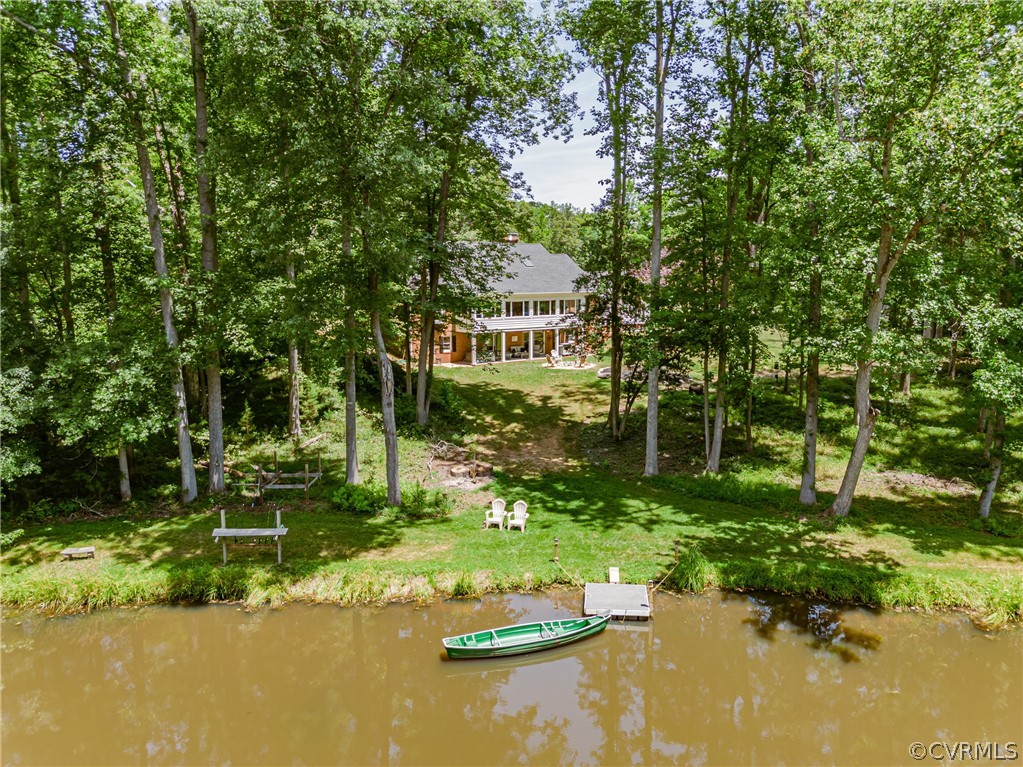 a view of a lake with a building in the background