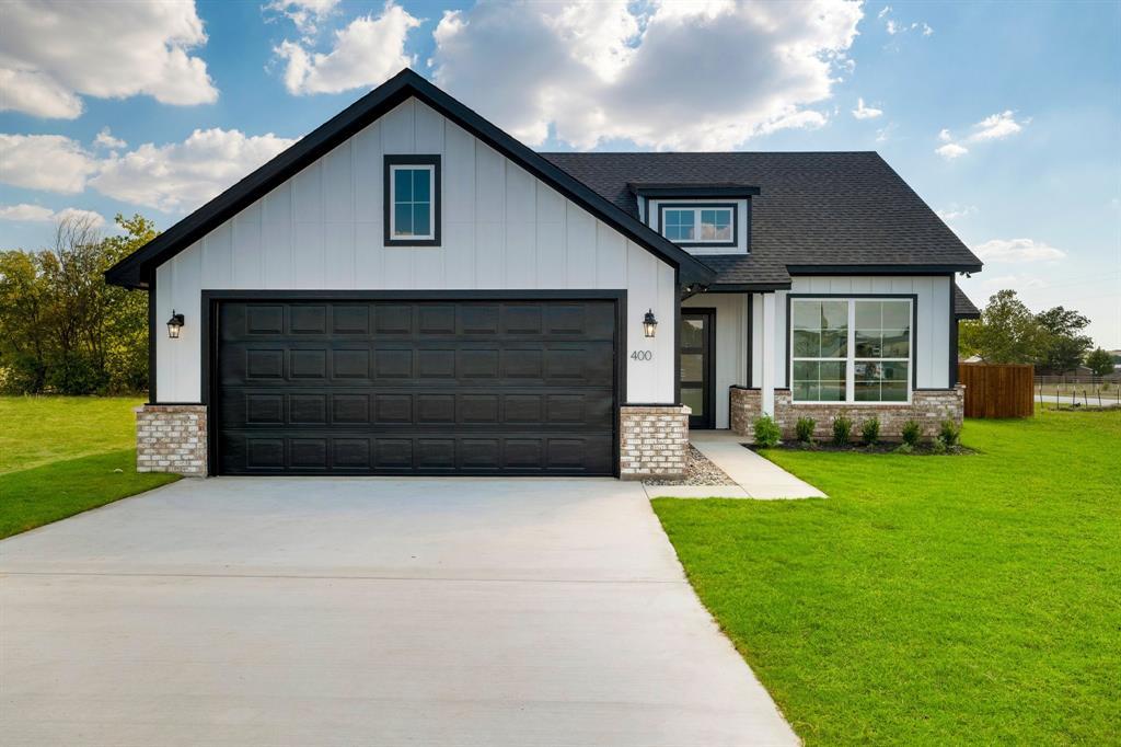 a house view with a garden space