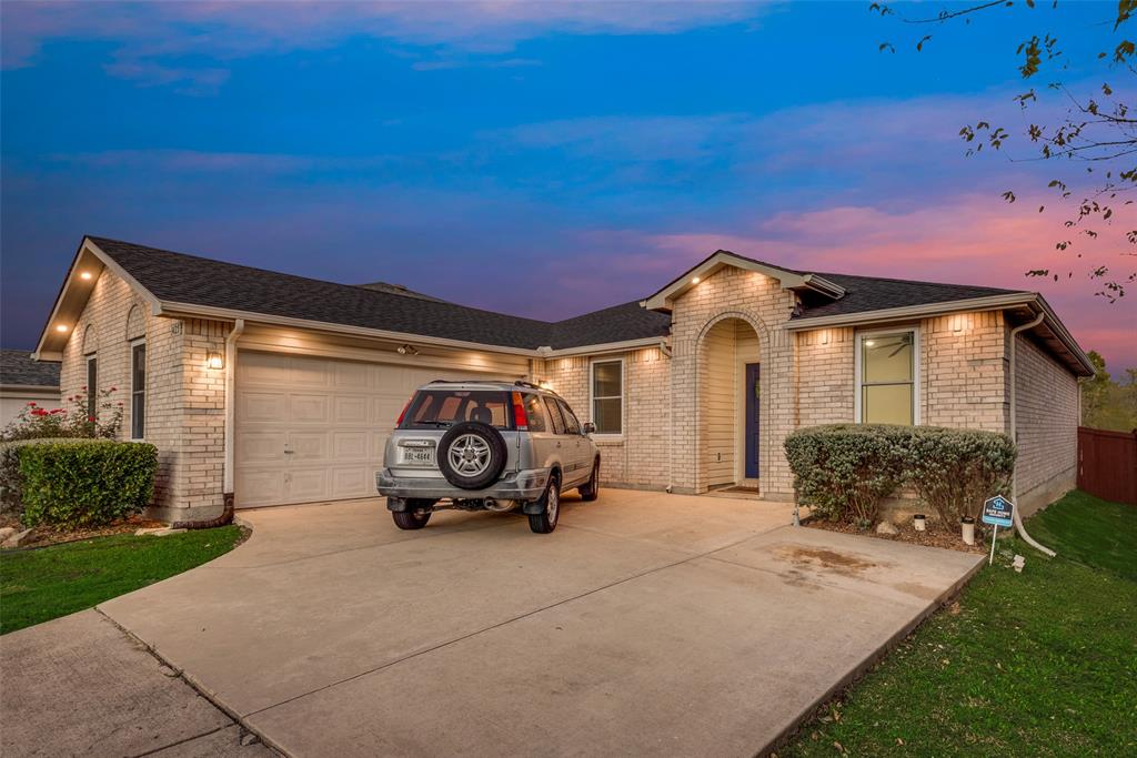 a car parked in front of a house