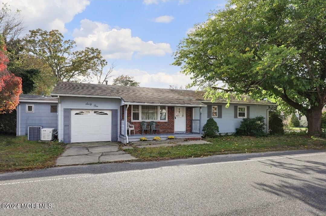 front view of a house with a small yard