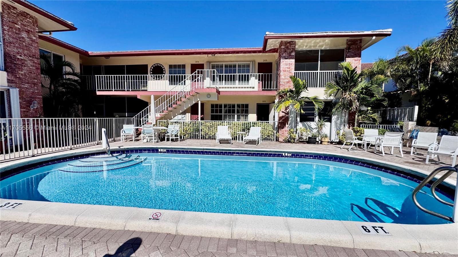 a view of a house with swimming pool