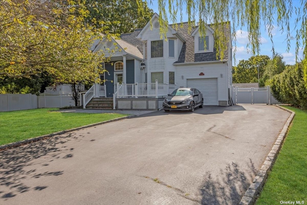 a view of a car park in front of house