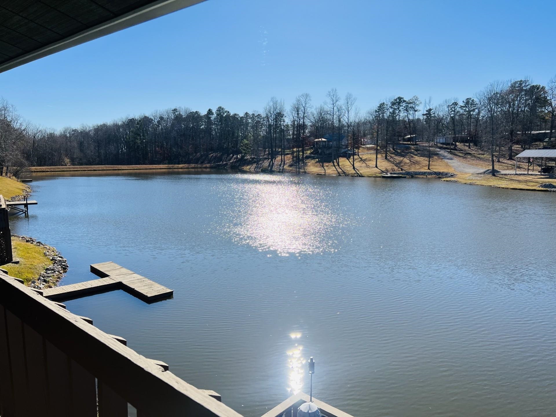 View of water feature featuring a dock