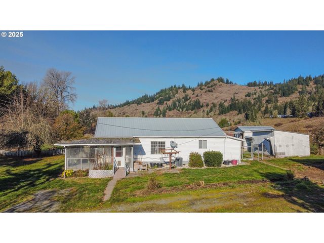 $299,000 | 49801 Highway 242 Broadbent Or 97414