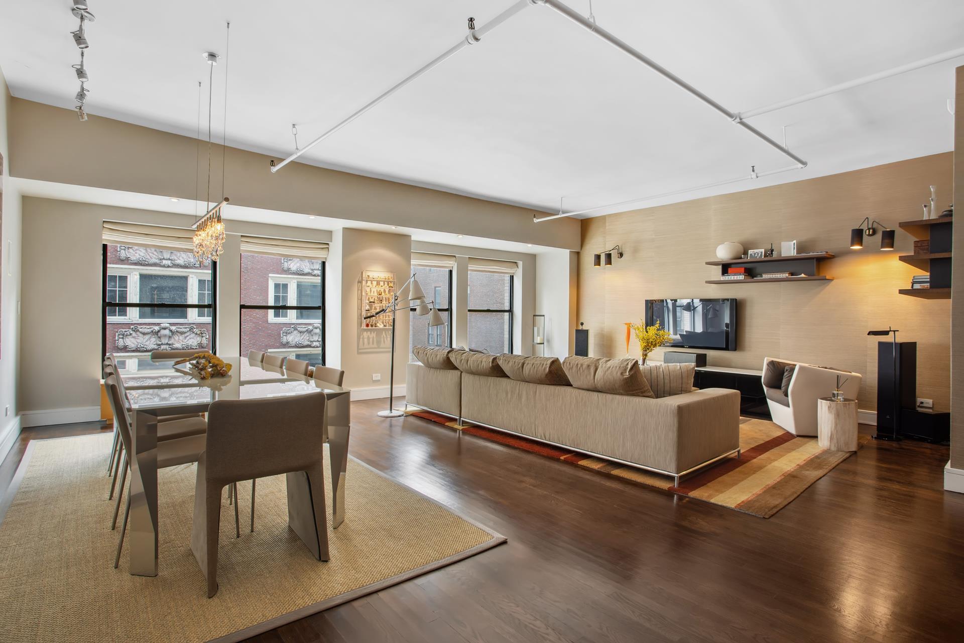 a living room with furniture and a table