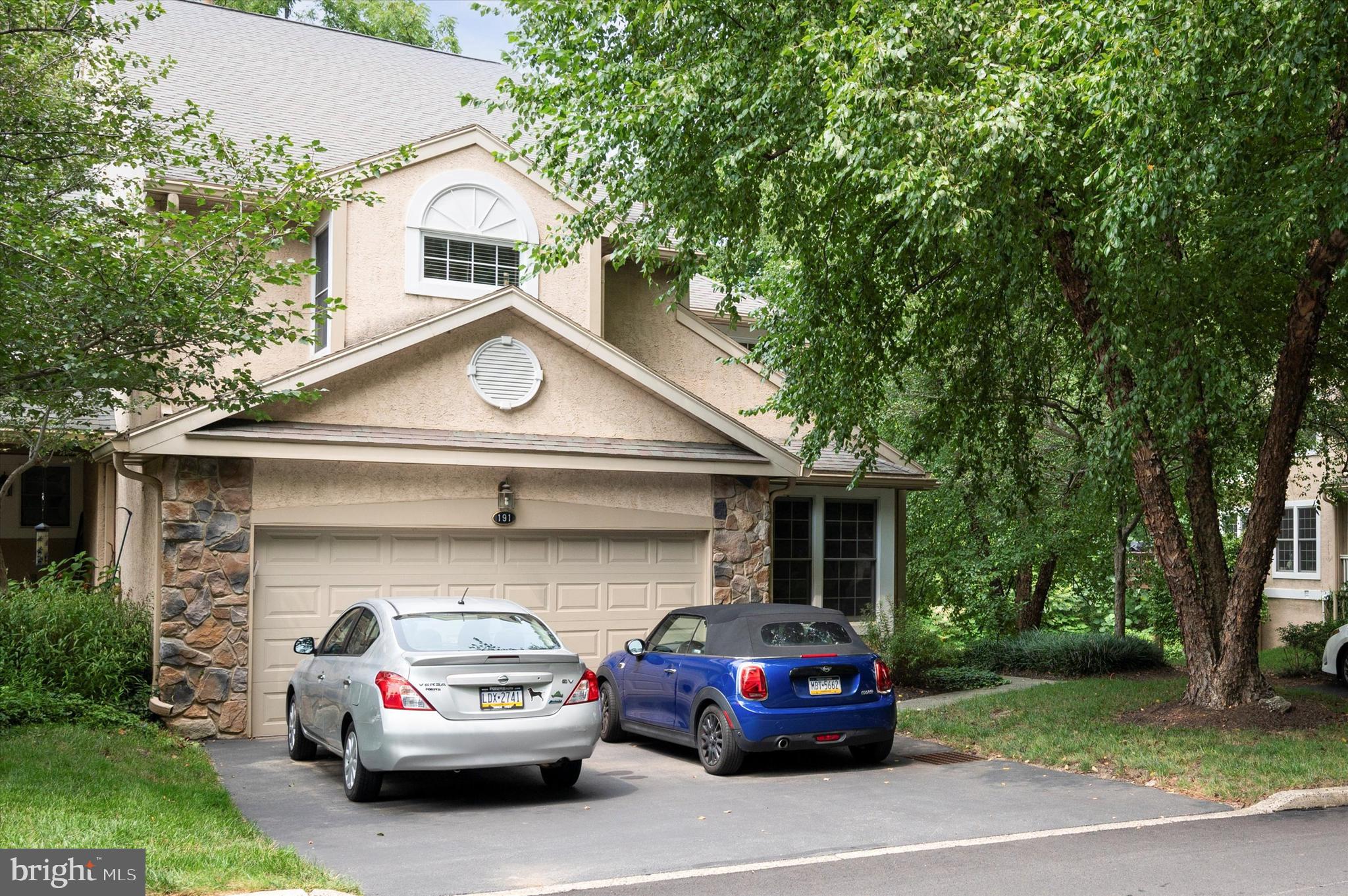 a car parked in front of a house