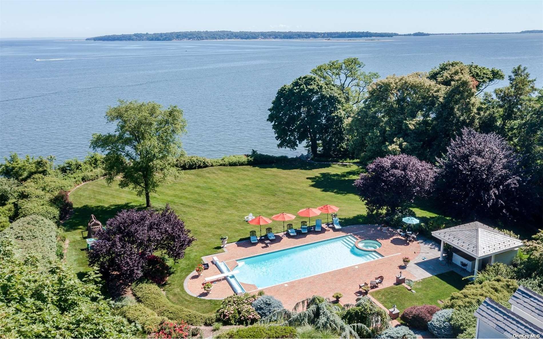 a view of a garden with an ocean