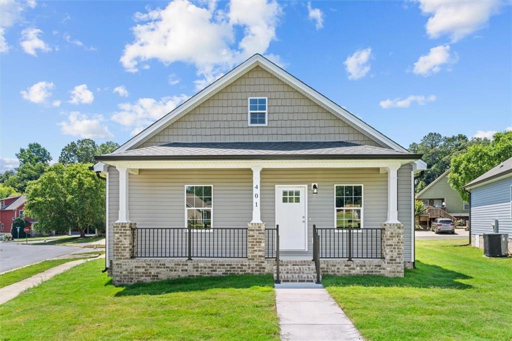 a front view of house with a yard