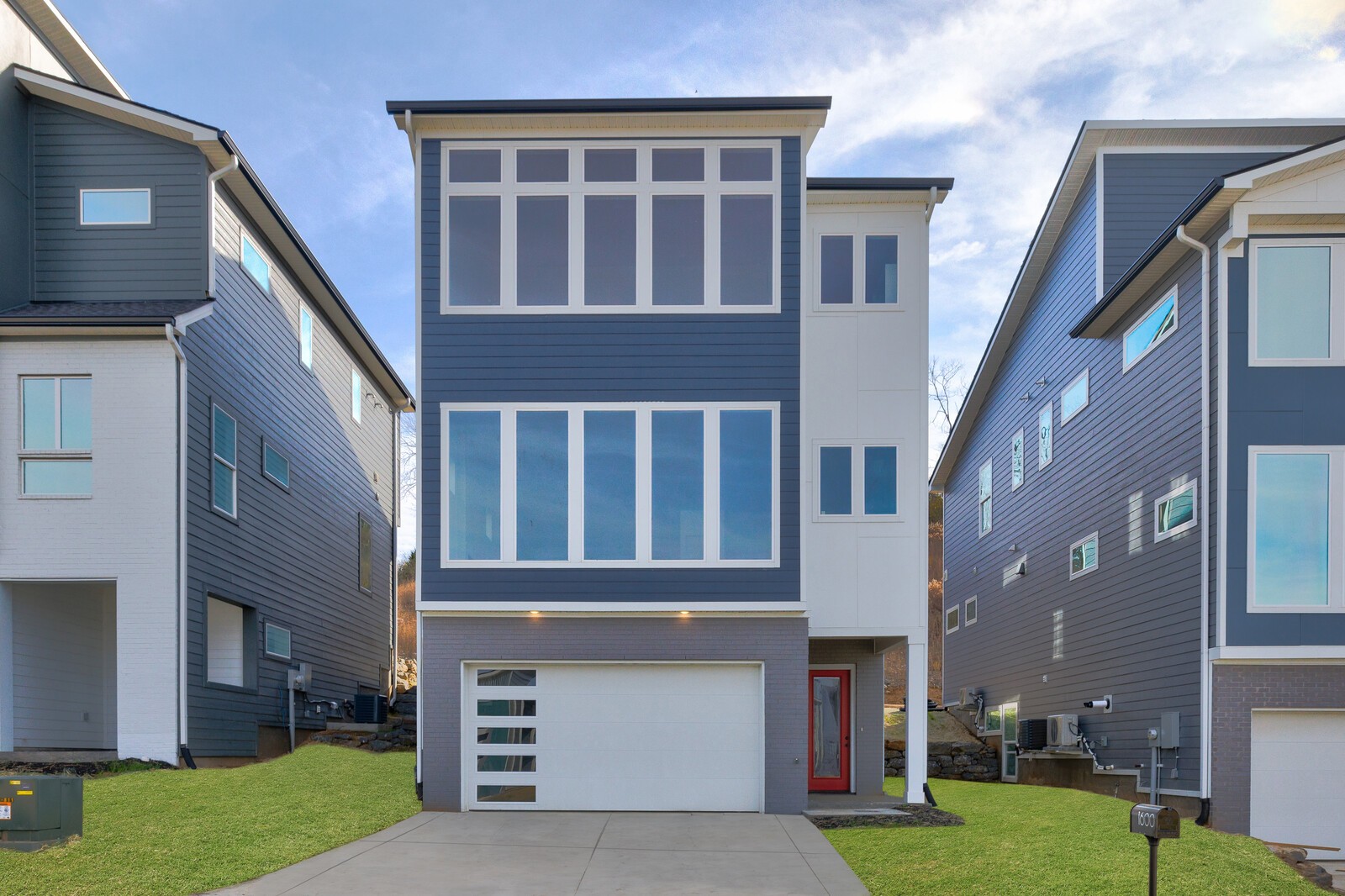 a view of a building with a yard