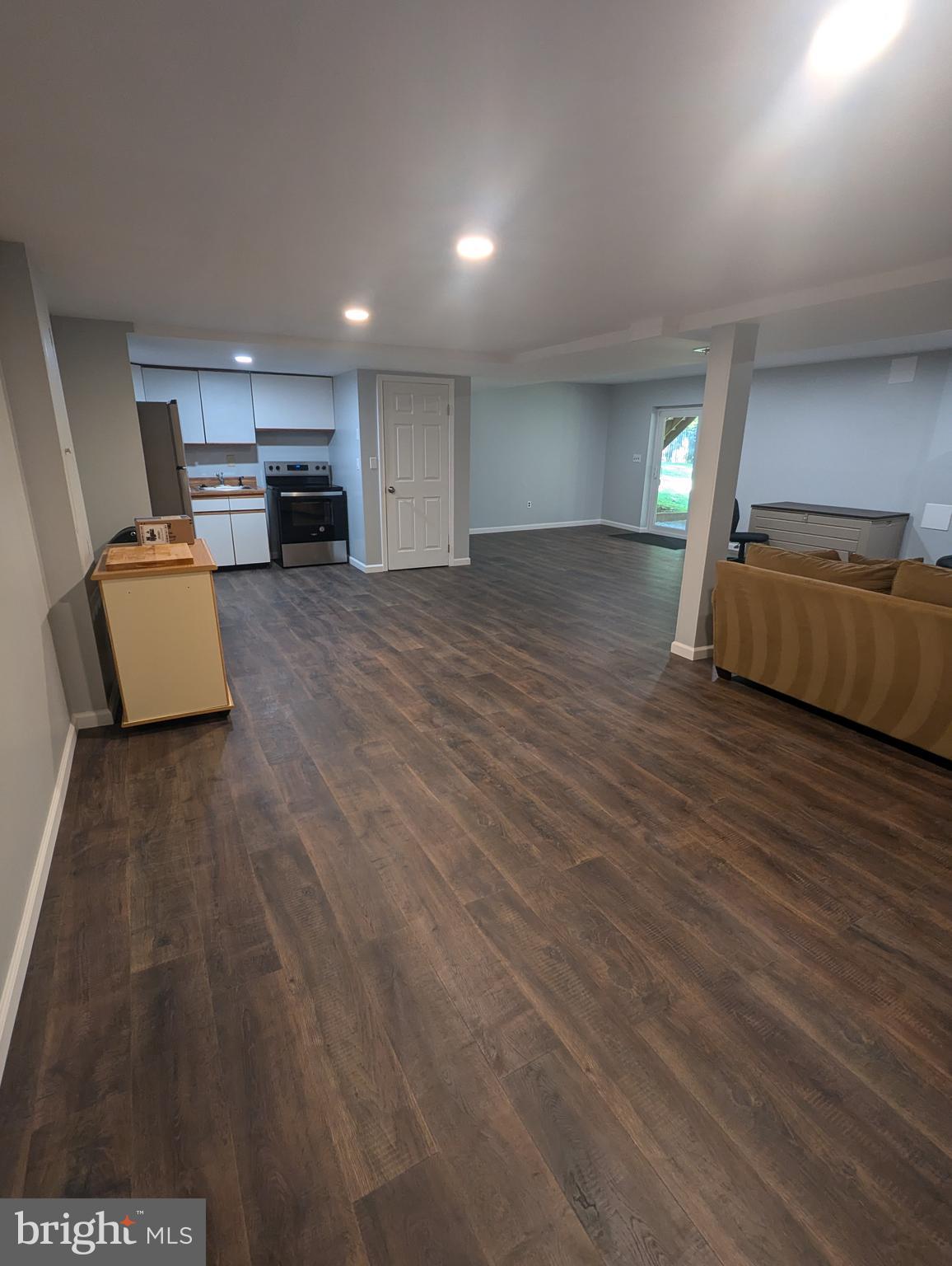 a view of kitchen and a sink