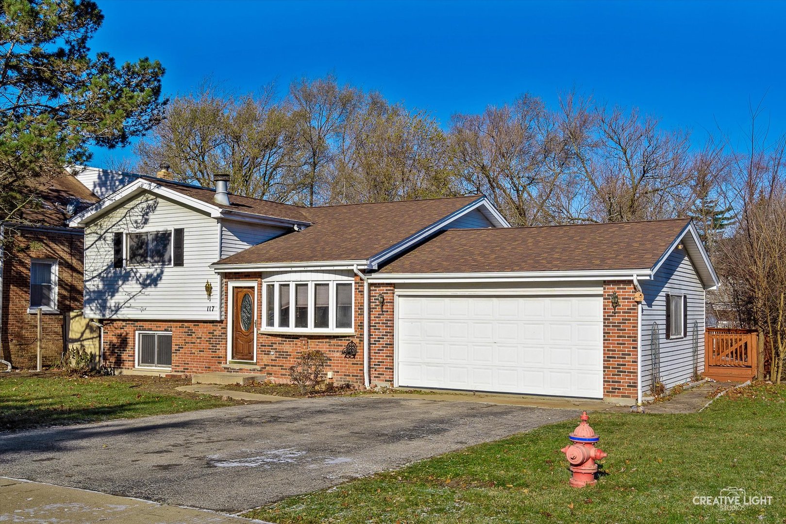 front view of a house with a yard