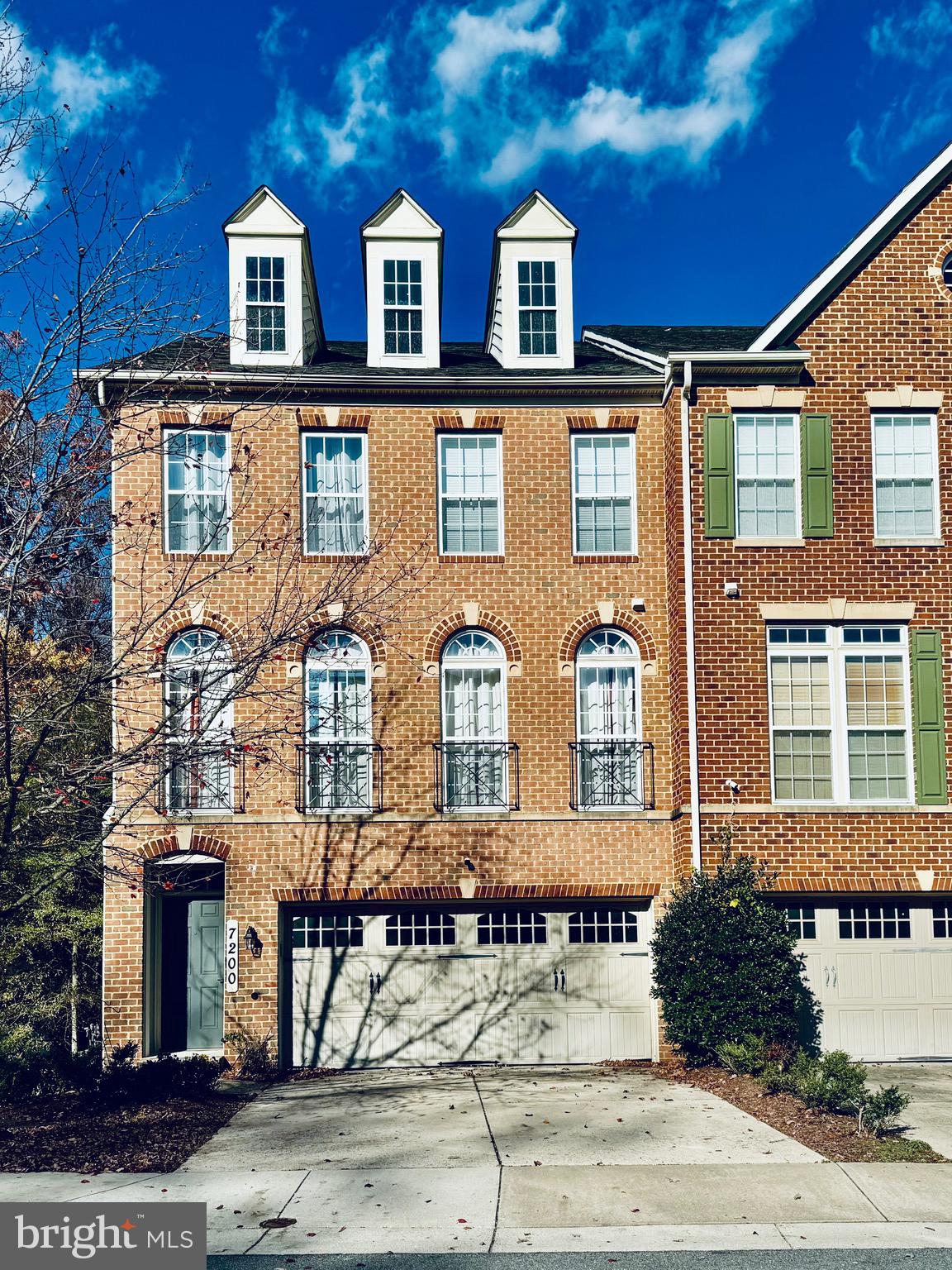 a front view of residential houses