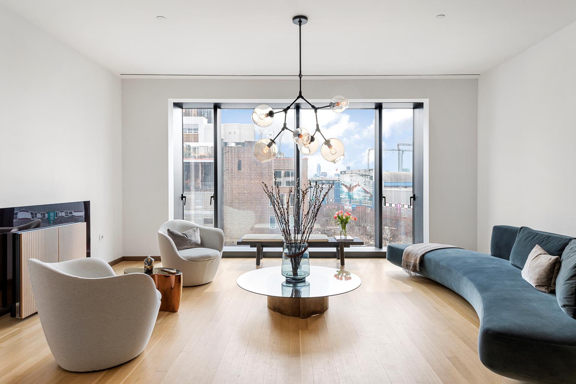 a living room with couches and a coffee table