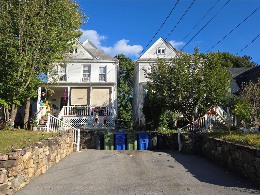 View of front of house with covered porch