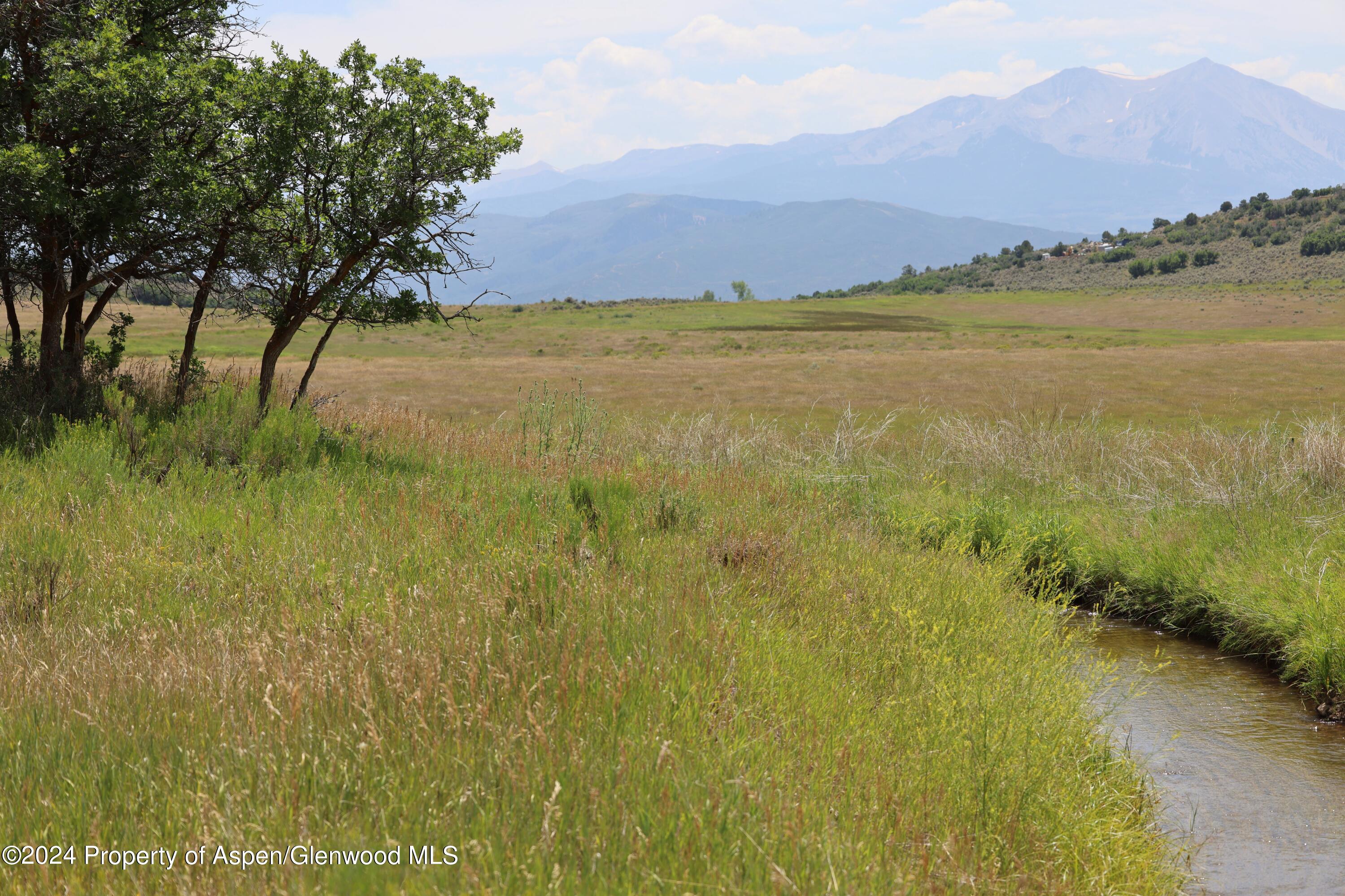 a view of an outdoor space and mountain view